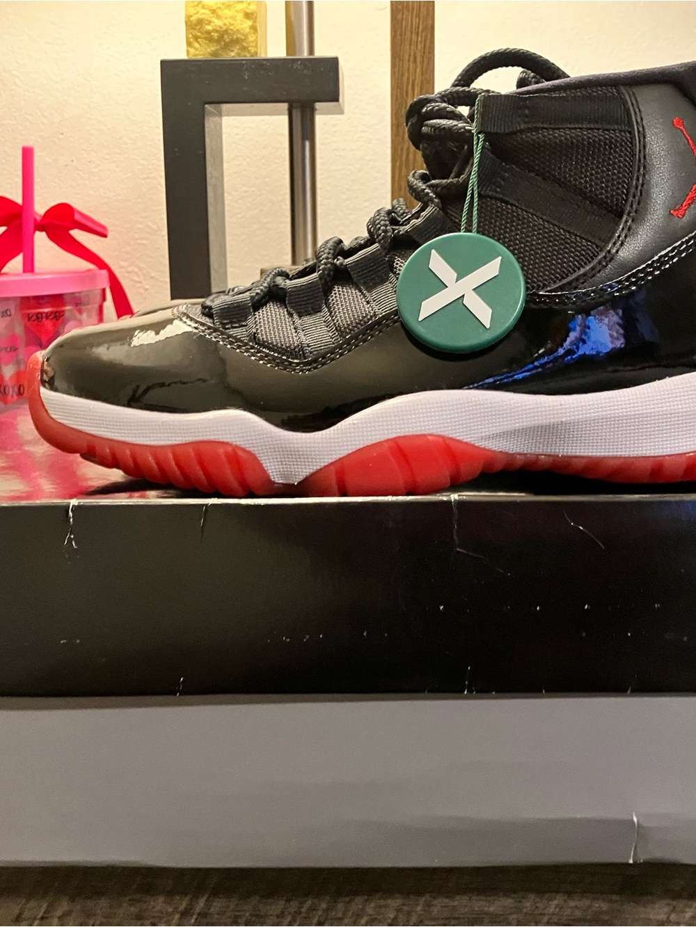Brand new with tags. Never worn Jordan Black and Red Retro High-Top Sneaker